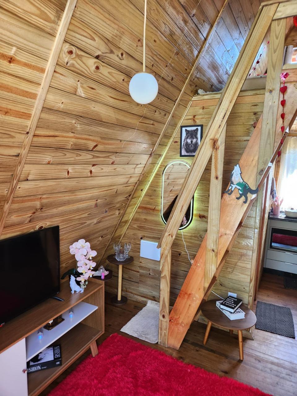 Lobo Prime — Deck privativo da cabana A-frame